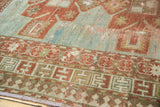 Antique Caucasian rug's Laleh Abassi pawn motif border with textured powder blue field.