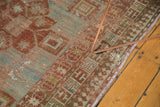 Distressed antique Caucasian rug border, terra cotta and pale blue, with Laleh Abassi motif.
