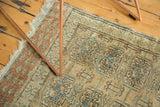 Distressed vintage Turkmen rug featuring triple Bokhara guls in faded beige and powder blue.