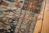 Hard tatter along the floral border and side of the antique Haji Jalili Tabriz rug.