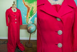 Vintage 60s hot pink two-piece suit with a long coat and sparkling rhinestone buttons.