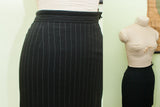Vintage Jean Paul Gaultier black pinstripe suit skirt on mannequin.