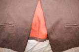 Vintage Burberry's vest brown suede lower front, salmon-orange lining, and two welt pockets.