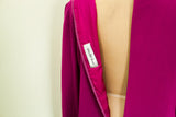 Saks Fifth Avenue label and open zipper detail on fuchsia designer dress.