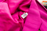 Vintage fuchsia dress featuring textured crepe, smooth silk lining, and union label.