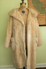 Mod ivory 60s sheared beaver fur coat with large clear buttons and pocket.