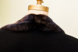 Vintage Dunhill Tailors black wool coat: Dark fur collar texture.
