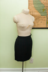 Vintage 80s Gaultier black pinstripe suit skirt with classic straight cut.