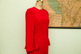 Vintage red Carolina Herrera party dress, side view with ruffled satin hip detail.