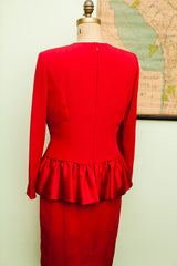 Vintage Carolina Herrera red dress back with ruffled satin peplum.