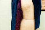 Blue velvet Geoffrey Beene jacket with white polka dots and deep purple lining.