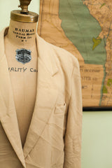 Notched lapel and chest pocket detail of a vintage 70s Abercrombie cashmere jacket.