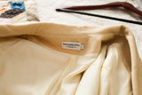 Vintage Abercrombie & Fitch woven label and size tag on the cashmere collar.