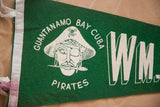 Detailed pirate graphic with a skull-and-crossbones hat on a green felt pennant.