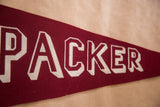 Vintage burgundy felt pennant with cream 'KER' letters and aged texture.