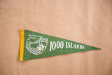 Vintage green felt flag with white International Bridge graphic and '1000 Islands' lettering.