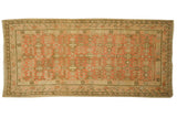 Vintage Khotan rug with allover geometric design on a peachy rose field, 5'2