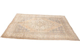 Blanched vintage Turkish Oushak carpet, faded medallion, ivory, beige, silver tones.