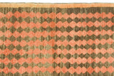 Thick pile vintage Oushak runner: melon red, chocolaty brown checkered pattern, orange border.