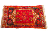 Vintage Red Turkish Yastik rug with geometric medallion and tribal motifs, 1'8