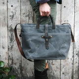 Peg and Awl Slate waxed canvas tote, featuring reclaimed leather and brass details.