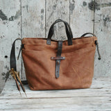 Peg and Awl Spice waxed canvas tote bag with dark reclaimed leather straps.