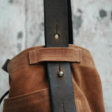 Spice waxed canvas tote with dark reclaimed leather strap and brass button stud.