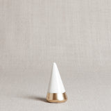White and gold porcelain ring holder with smooth ivory glaze and gold leaf.