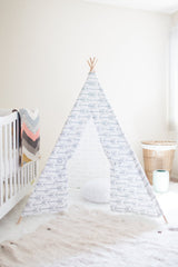 White modern kids teepee with gray arrows and natural wooden poles, 5ft tall.