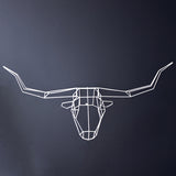 Longhorn wire sculpture with intricate geometric framework.