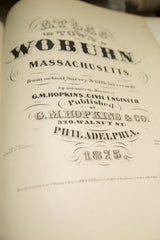 Ornate 19th-century typography on the 1875 title page of the G.M. Hopkins Woburn atlas.
